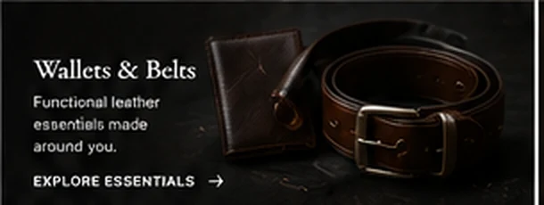 Premium leather wallet and belt arranged in an editorial setting